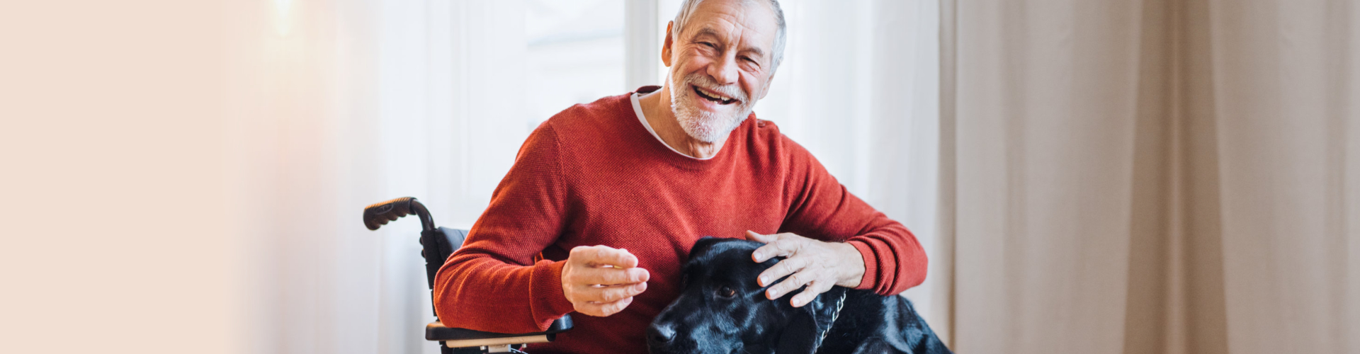 A picture of an elderly with his dog